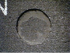 An example of a counterfeit where the indent shows a partly smooth and a partly textured surface