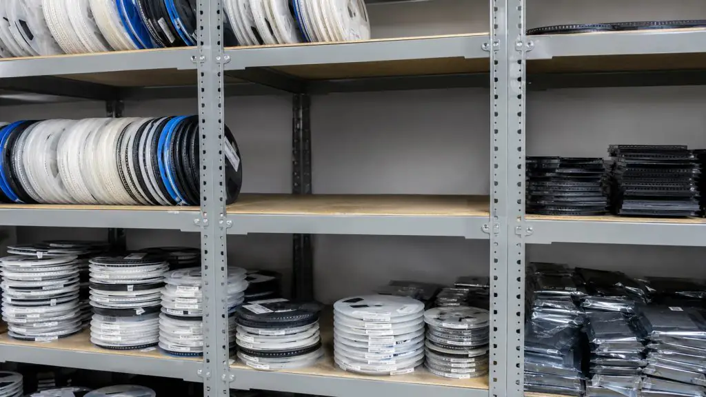 Rows of nearly empty warehouse shelves illustrating the 2026 electronic component shortage